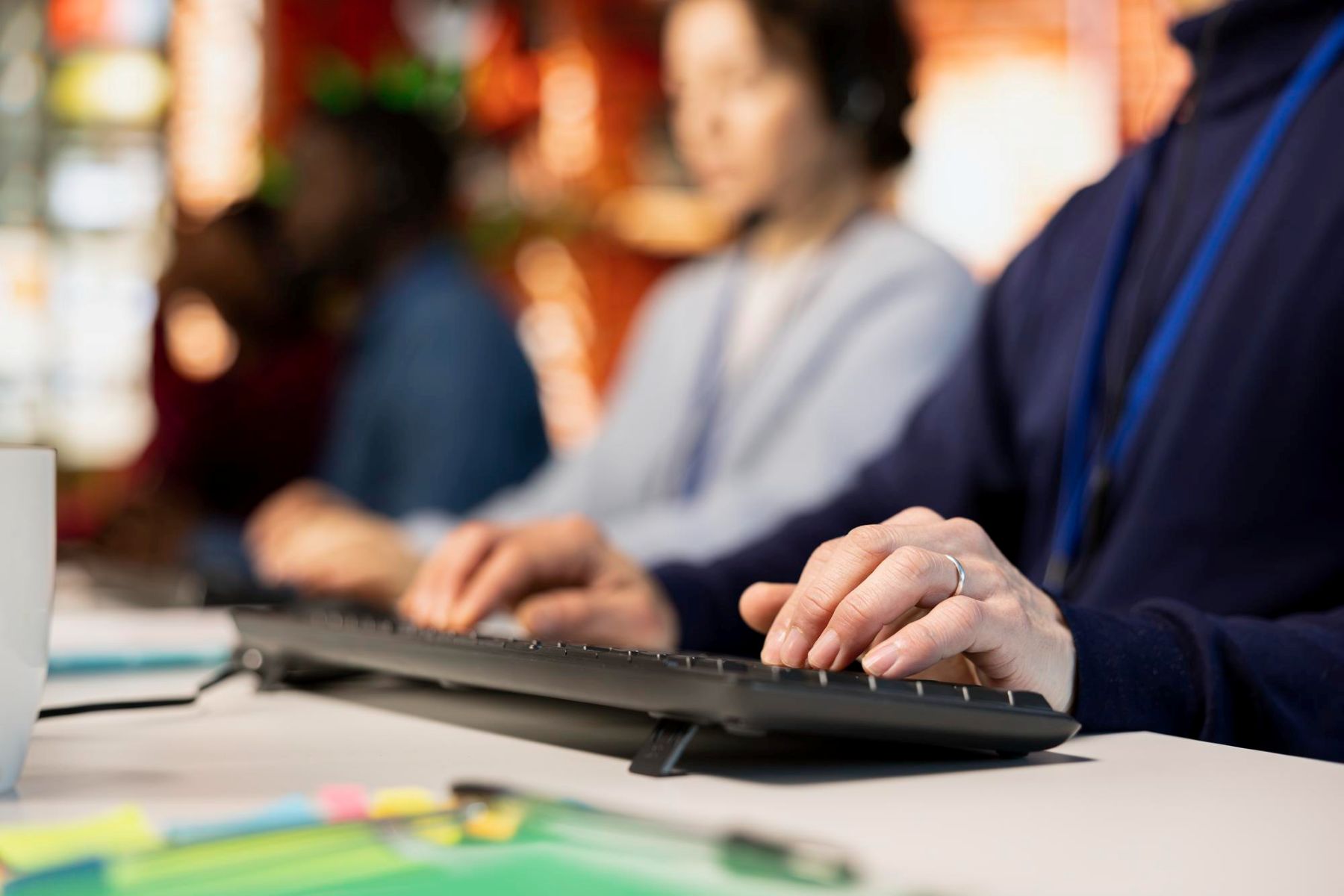 Man uses keyboard at office